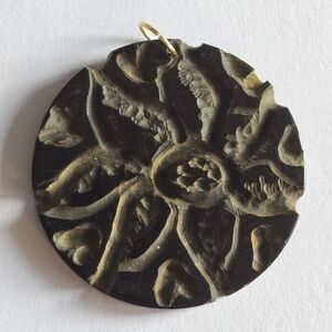 Vintage pendant brown floral round circle disc carved flowers charm